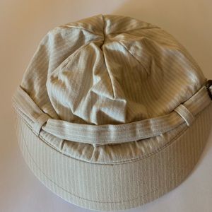 Gap women’s hat cream with white stripes.